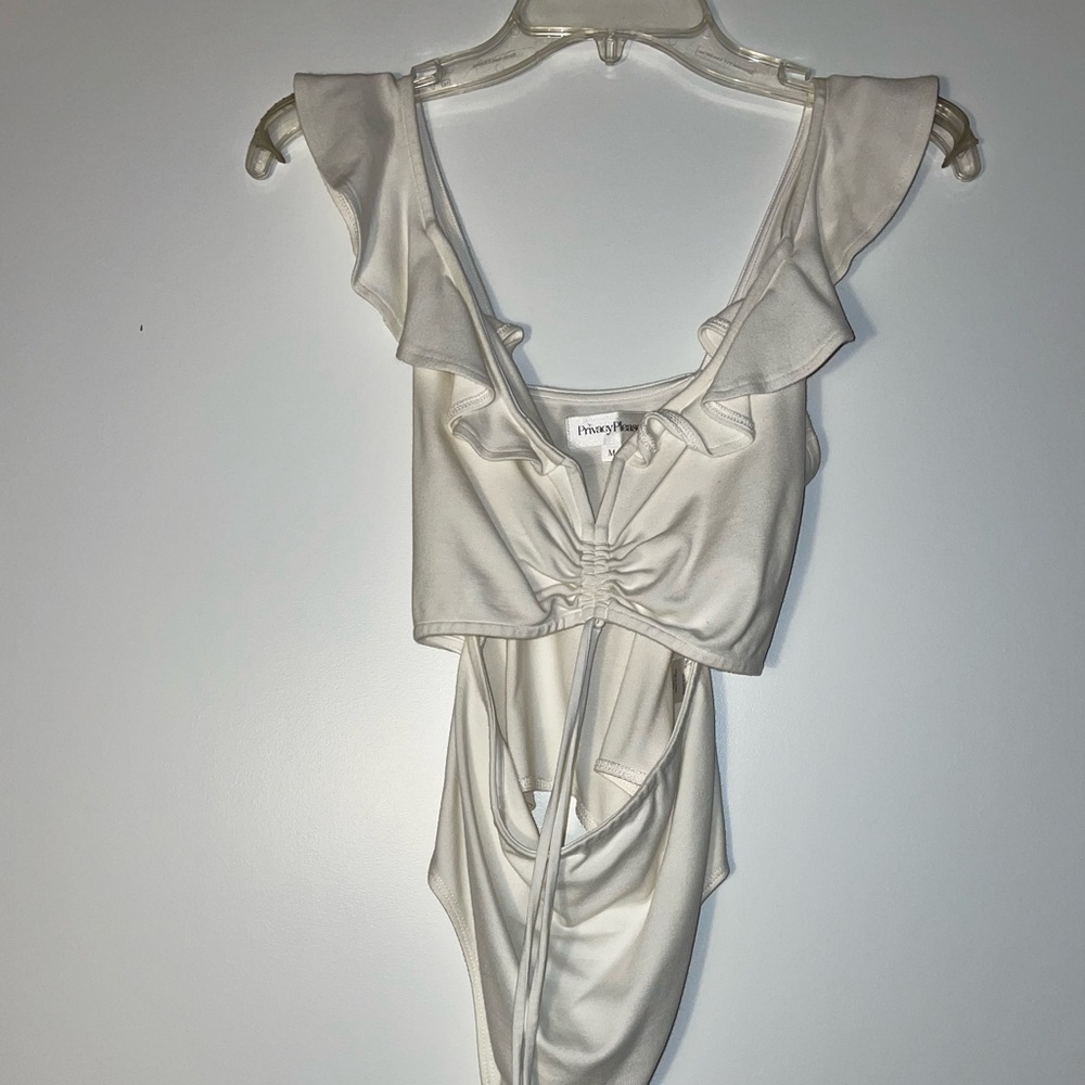 Revolve body suit